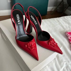 Red pointy toe Versace heels. ❤️❤️